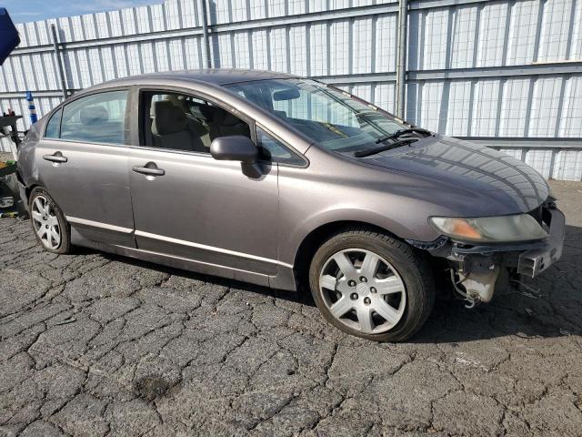 Photo 4 from auction – 2010 HONDA CIVIC LX with VIN 19XFA1F52AE018606