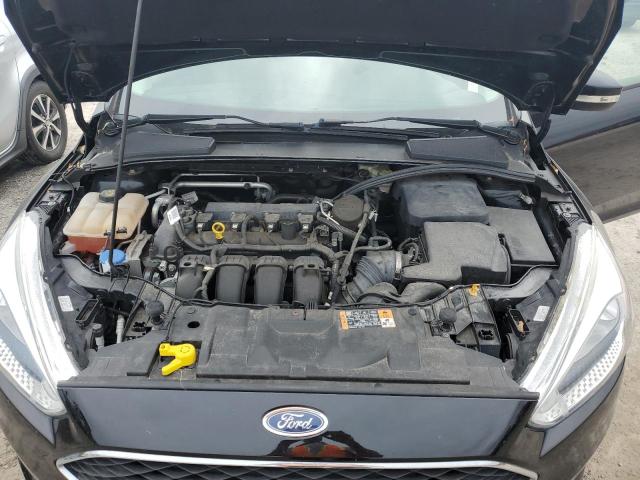 Photo 11 from auction – 2016 FORD FOCUS SE with VIN 1FADP3F25GL266314