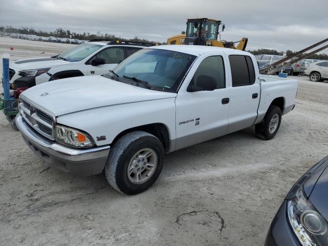 DODGE DAKOTA QUA 2000 with VIN 1B7GL2AN5YS642063 - Photo from auction