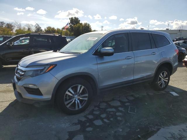 HONDA PILOT EXLN 2018 with VIN 5FNYF6H73JB036905 - Photo from auction