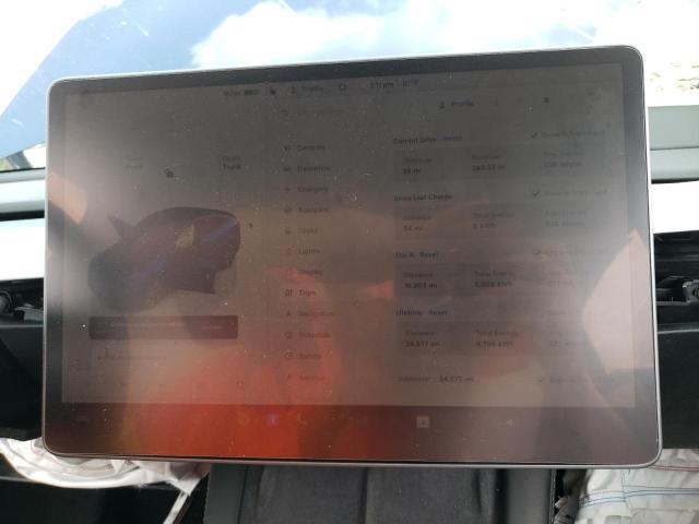 Photo 9 from auction – 2023 TESLA MODEL Y with VIN 7SAYGDEE3PF670666