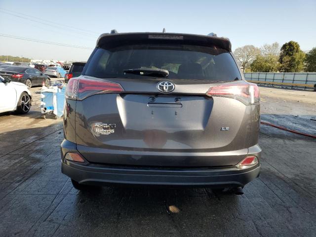 Photo 6 from auction – 2018 TOYOTA RAV4 LE with VIN JTMZFREV6JJ731607