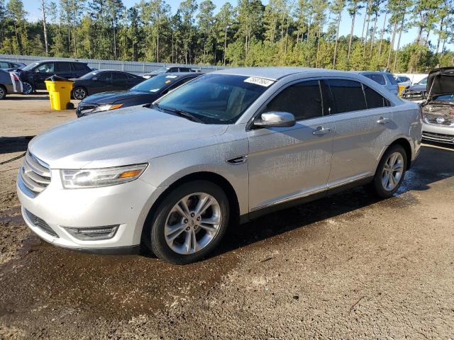 FORD TAURUS SEL 2014 with VIN 1FAHP2E80EG116649 - Photo from auction