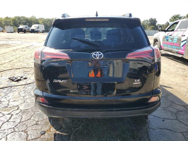 Photo 6 from auction – 2018 TOYOTA RAV4 with VIN 2T3BFREV0JW710478