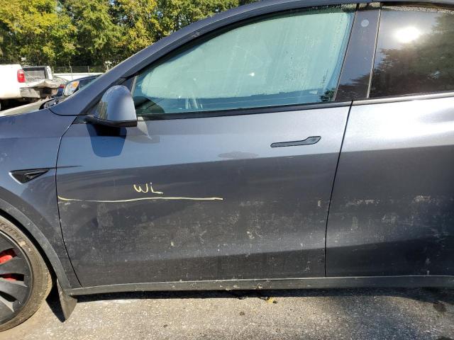 Photo 12 from auction – 2022 TESLA MODEL Y with VIN 7SAYGDEF4NF521270