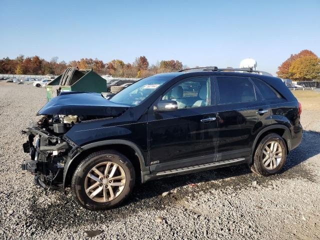 KIA SORENTO LX 2014 with VIN 5XYKTDA64EG502912 - Photo from auction