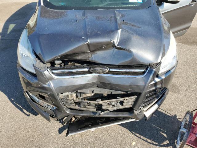Photo 11 from auction – 2015 FORD ESCAPE TIT with VIN 1FMCU9J95FUB44451