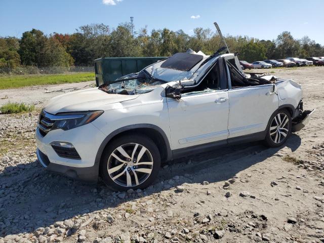 Photo 1 from auction – 2016 HONDA PILOT ELIT with VIN 5FNYF6H05GB041034