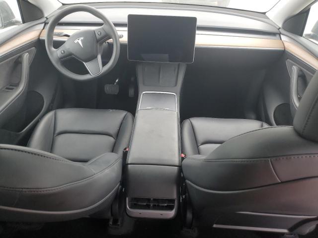 Photo 8 from auction – 2023 TESLA MODEL Y with VIN 7SAYGDED9PF965231