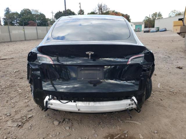 Photo 6 from auction – 2021 TESLA MODEL Y with VIN 5YJYGDEE8MF119805