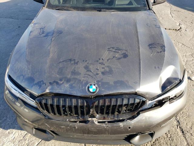 Photo 11 from auction – 2021 BMW 330I with VIN 3MW5R1J05M8B97143