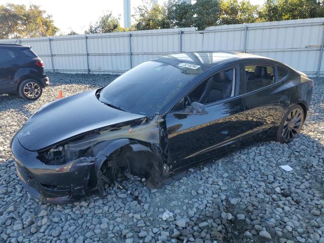 TESLA MODEL 3 2022 with VIN 5YJ3E1ECXNF103264 - Photo from auction