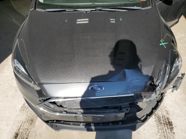 Photo 11 from auction – 2015 FORD FOCUS SE with VIN 1FADP3F24FL218494