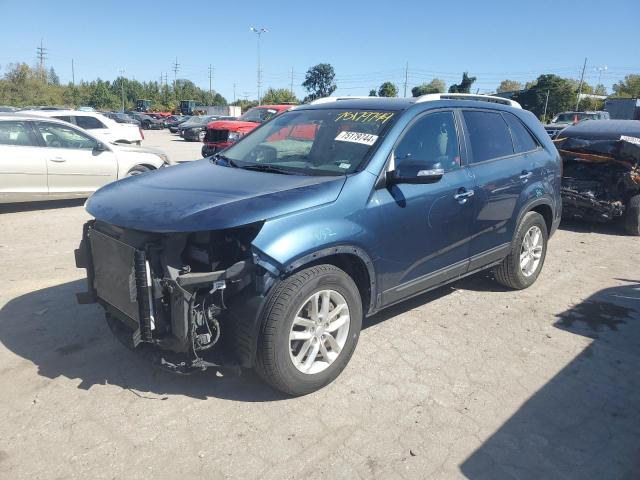 KIA SORENTO LX 2014 with VIN 5XYKT4A62EG501077 - Photo from auction