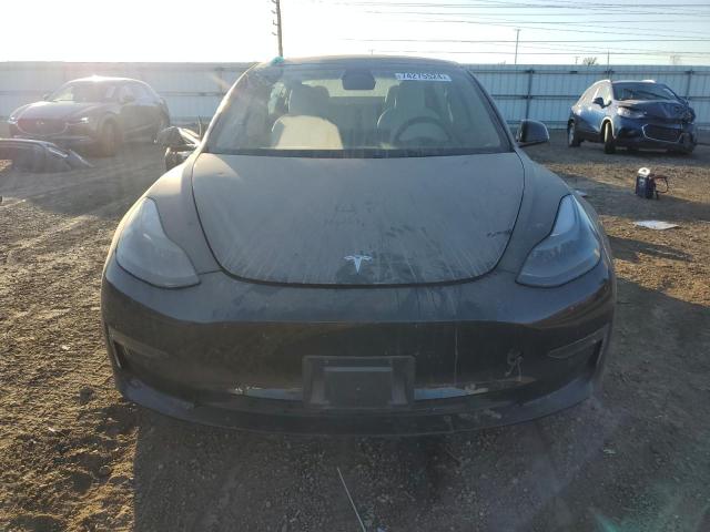 Photo 5 from auction – 2021 TESLA MODEL 3 with VIN 5YJ3E1EB9MF918058