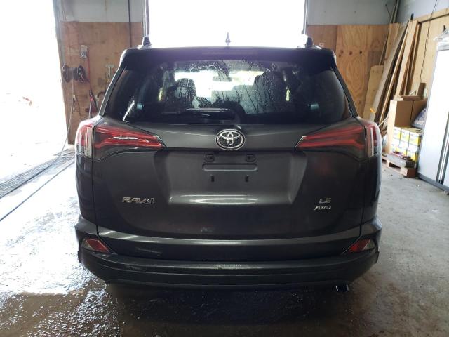 Photo 6 from auction – 2018 TOYOTA RAV4 LE with VIN JTMBFREV4JJ247341