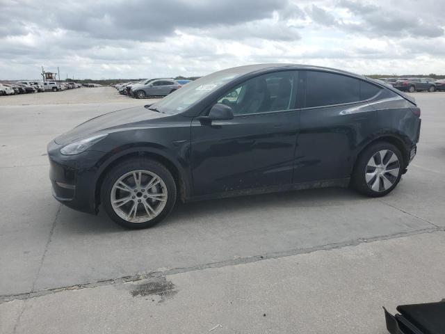 TESLA MODEL Y 2023 with VIN 7SAYGDED7PF966667 - Photo from auction