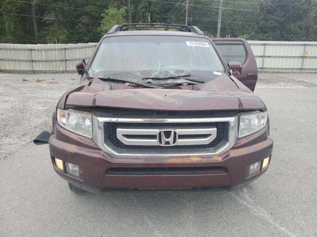 Photo 5 from auction – 2011 HONDA RIDGELINE with VIN 5FPYK1F58BB006887