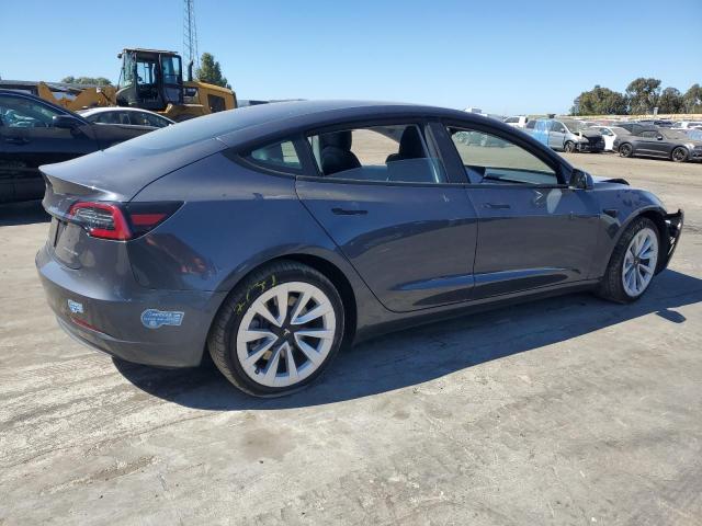 Photo 3 from auction – 2021 TESLA MODEL 3 with VIN 5YJ3E1EBXMF879531