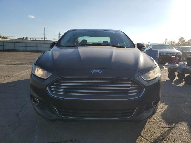Photo 5 from auction – 2014 FORD FUSION TIT with VIN 3FA6P0K90ER133856
