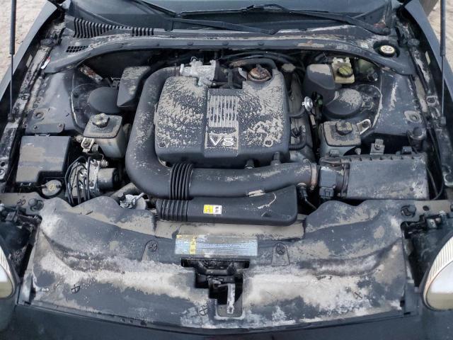 Photo 11 from auction – 2002 FORD THUNDERBIR with VIN 1FAHP60A42Y122154