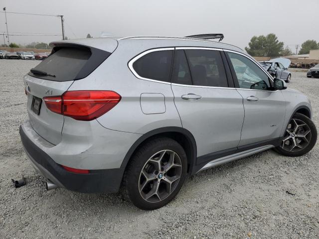 Photo 3 from auction – 2018 BMW X1 XDRIVE2 with VIN WBXHT3C31J5L26334