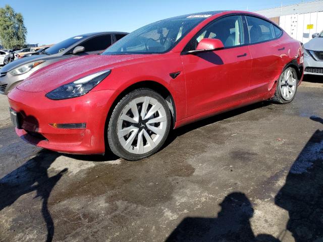 TESLA MODEL 3 2022 with VIN 5YJ3E1EB3NF304897 - Photo from auction