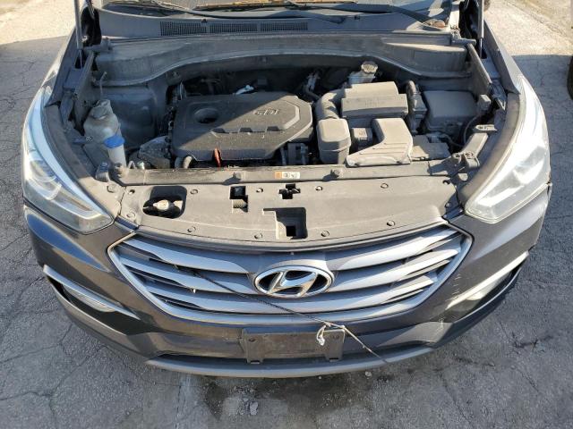 Photo 12 from auction – 2018 HYUNDAI SANTA FE S with VIN 5NMZU3LB4JH068264