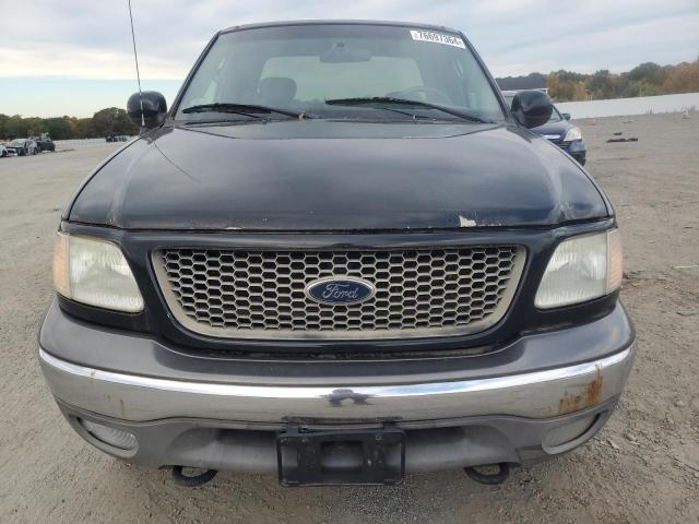 Photo 5 from auction – 2003 FORD F150 with VIN 1FTRX18W43NB69947