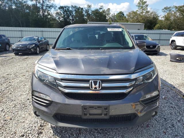Photo 5 from auction – 2018 HONDA PILOT EXL with VIN 5FNYF5H58JB019963