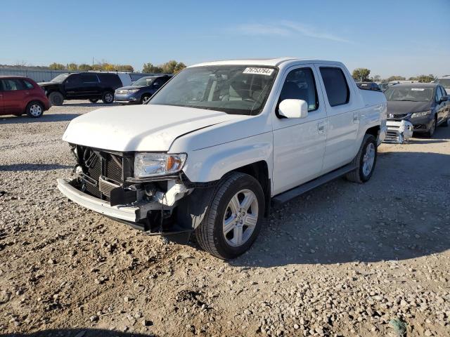 HONDA RIDGELINE 2014 with VIN 5FPYK1F59EB001735 - Photo from auction