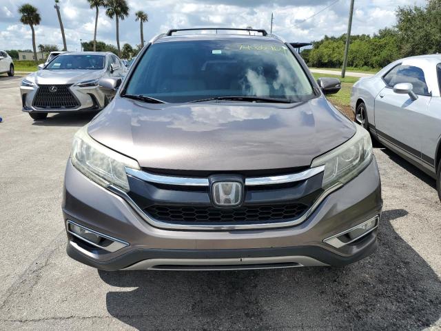 Photo 5 from auction – 2015 HONDA CR-V TOURI with VIN 5J6RM3H93FL019272