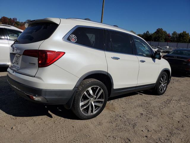 Photo 3 from auction – 2017 HONDA PILOT TOUR with VIN 5FNYF5H99HB003686