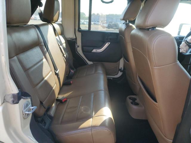 Photo 11 from auction – 2011 JEEP WRANGLER U with VIN 1J4BA5H10BL558961