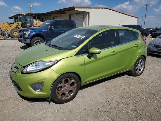 FORD FIESTA SES 2011 with VIN 3FADP4FJ1BM121775 - Photo from auction
