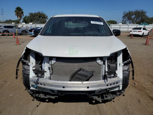 Photo 5 from auction – 2021 HONDA PASSPORT E with VIN 5FNYF8H52MB030771