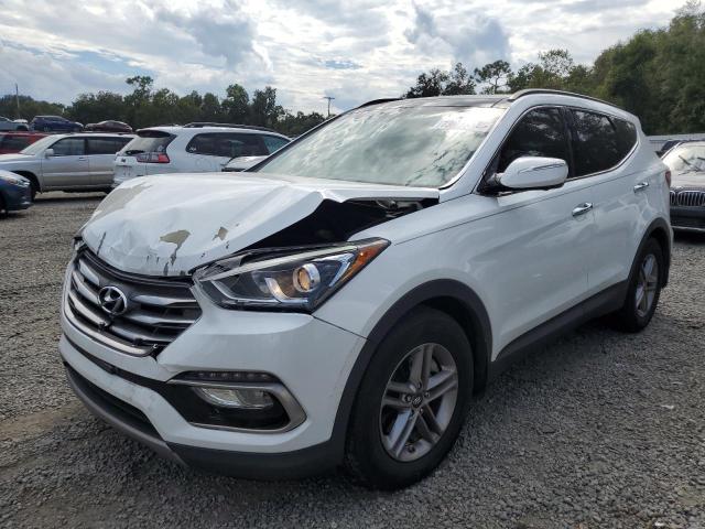 HYUNDAI SANTA FE S 2017 with VIN 5NMZU3LBXHH037742 - Photo from auction