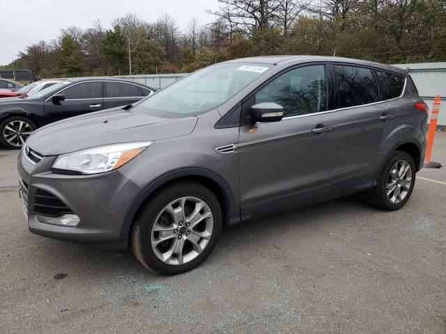FORD ESCAPE SEL 2013 with VIN 1FMCU9HX0DUB42642 - Photo from auction