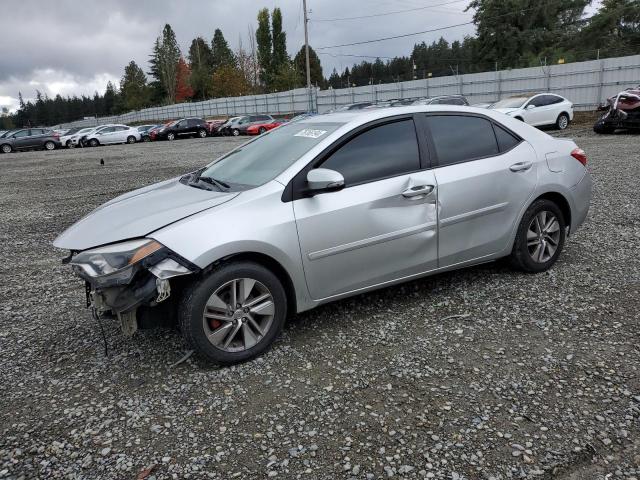 TOYOTA COROLLA L 2014 with VIN 5YFBURHE1EP099989 - Photo from auction
