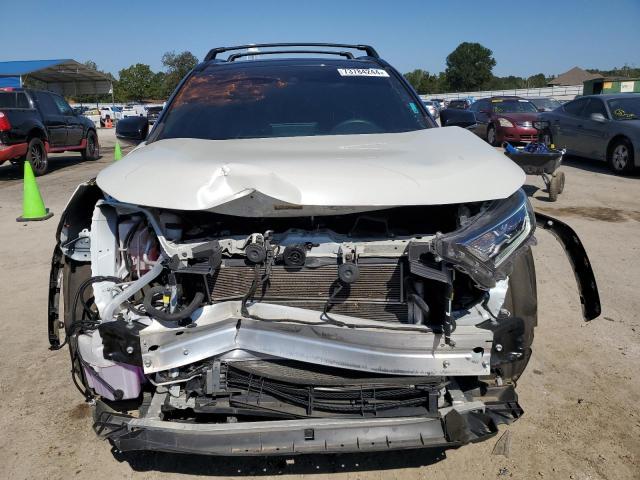 Photo 5 from auction – 2021 TOYOTA RAV4 XSE with VIN 2T3E6RFV4MW028378