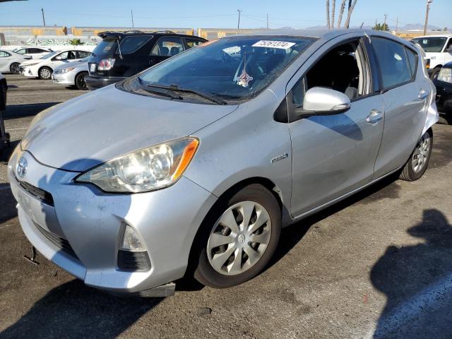 TOYOTA PRIUS C 2014 with VIN JTDKDTB32E1558567 - Photo from auction