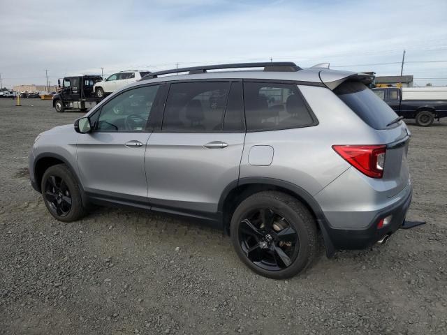 Photo 2 from auction – 2021 HONDA PASSPORT E with VIN 5FNYF8H03MB021114