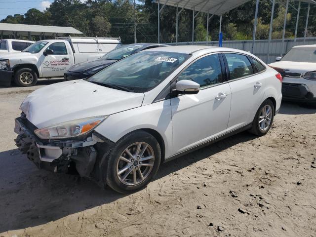 FORD FOCUS SE 2015 with VIN 1FADP3F22FL381614 - Photo from auction