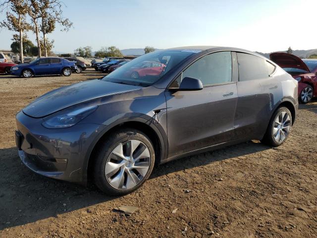 TESLA MODEL Y 2023 with VIN 7SAYGDED6PF960469 - Photo from auction