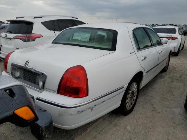 Photo 3 from auction – 2003 LINCOLN TOWN CAR E with VIN 1LNHM81WX3Y703969