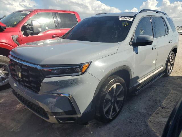 Photo 1 from auction – 2023 HONDA PILOT TOUR with VIN 5FNYG2H72PB003263