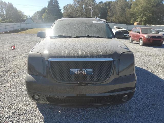 Photo 5 from auction – 2011 GMC YUKON DENA with VIN 1GKS1EEFXBR121055