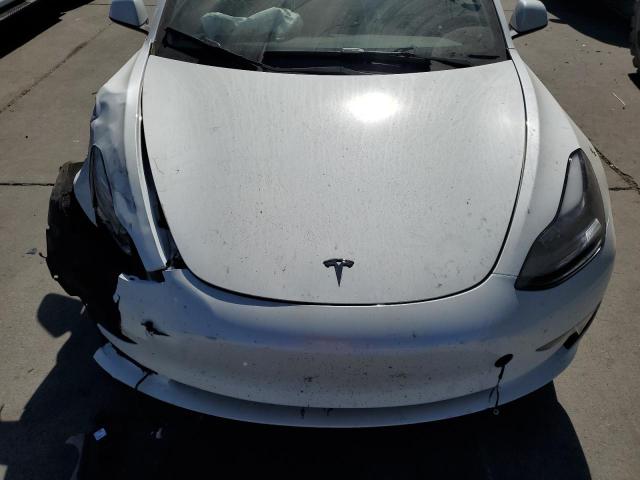 Photo 11 from auction – 2023 TESLA MODEL 3 with VIN 5YJ3E1EA7PF612438