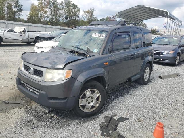 HONDA ELEMENT LX 2011 with VIN 5J6YH1H39BL002535 - Photo from auction