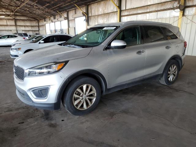 KIA SORENTO LX 2016 with VIN 5XYPG4A54GG182785 - Photo from auction
